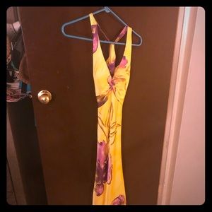 Satin yellow evening gown with purple flowers